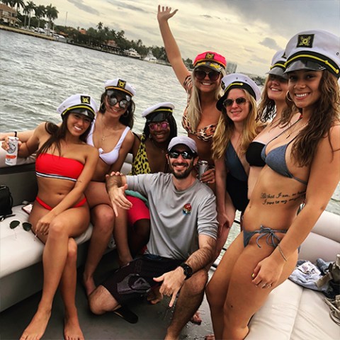 a group of people sitting posing for the camera