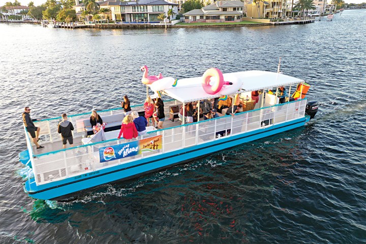 a group of people on a boat in a body of water